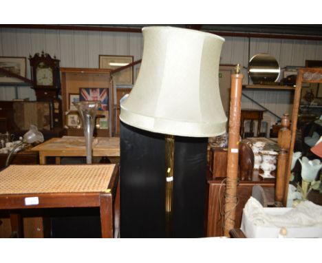 A good quality brass standard lamp and shade 