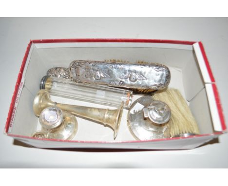 A box of mixed silver, to include silver mounted brushes, spill vase, dwarf candlestick etc.