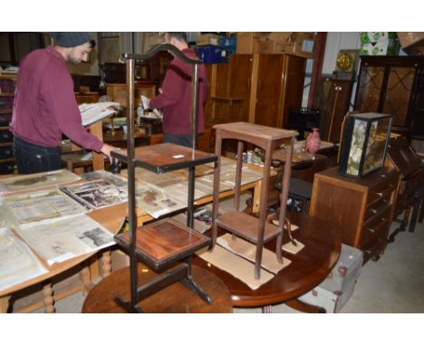 A mahogany and ebonised two tier cake stand; a walnut wine table; and an oak two tier table 