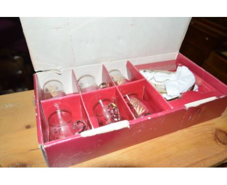 A set of 6 Bohemian glass cups and saucers
