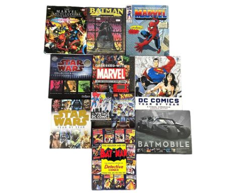 A collection of books on Comics, Superheroes &amp; Star Wars. Batman Masterpieces, The Marvel Encyclopedia, 5 decades of Marv