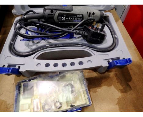 Boxed Dremel multi tool with attachments. All electrical items in this lot have been PAT tested for safety and have passed. T