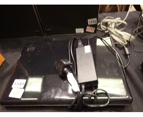 HP laptop with Windows Vista and charging lead, working. All electrical items in this lot have been PAT tested for safety and