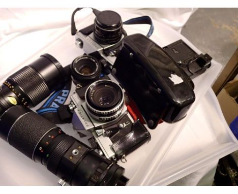 Praktica B200 cased camera with a 50mm lens with two compact cameras and a cased pair of Miranda binoculars. Not available fo