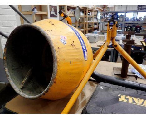Belle Group electric concrete mixer with stand. All electrical items in this lot have been PAT tested for safety and have pas