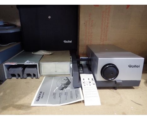 Boxed Rollei projector and slide cases. Not available for in-house P&amp;P 