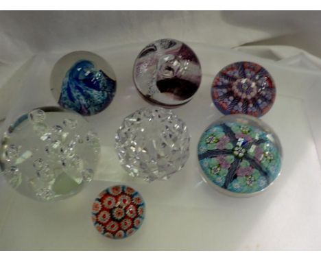 Collection of seven paperweights including Caithness. Not available for in-house P&amp;P 