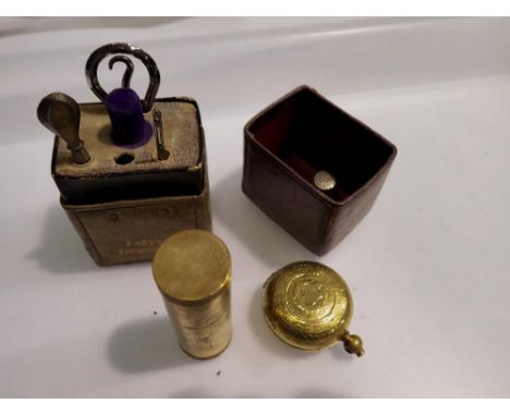Brass cigarette lighter, a brass sovereign case and a ladies companion accessories set. UK P&amp;P Group 1 (£16+VAT for the f