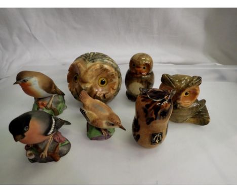 Group of three Royal Worcester bird figures, alabaster carved owl figures and a Langham Glass paperweight. Not available for 