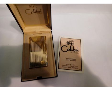 Boxed Colibri gold plated lighter. UK P&amp;P Group 1 (£16+VAT for the first lot and £2+VAT for subsequent lots) 