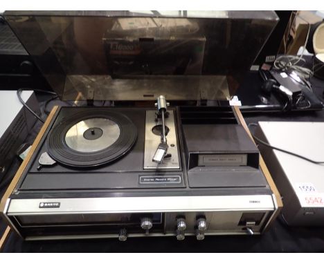 Sanyo turntable and 8 track player. All electrical items in this lot have been PAT tested for safety and have passed. This do
