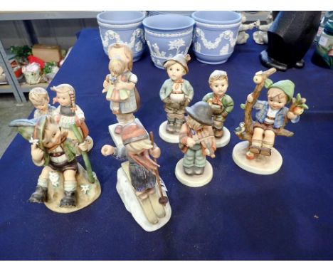 Eight Hummel figures with damages. UK P&amp;P Group 3 (£30+VAT for the first lot and £8+VAT for subsequent lots) 