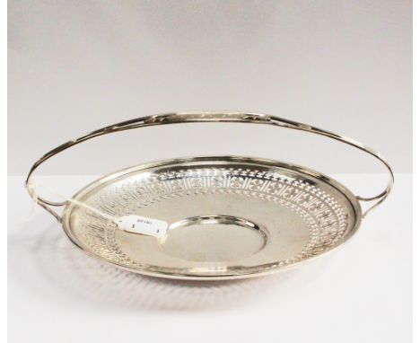Kindly donated by celebrity auctioneer Charlie Ross.


An American Art Nouveau sterling silver basket of circular form, with 