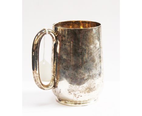 A late Victorian silver tankard of plain baluster form, "C" scroll handle, makers RM, EH, Sheffield 1894, 313 grams.

TO BE S
