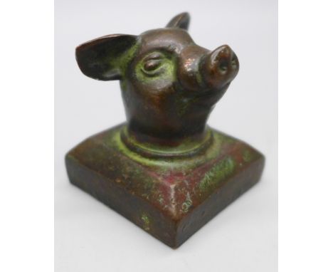 A Chinese bronze seal in a form of pig's head 