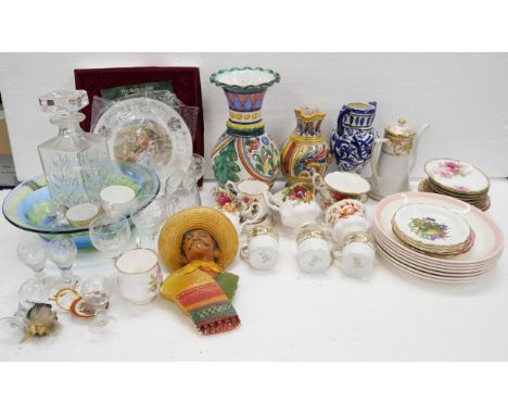 A collection of china includes Royal Albert Old Country Roses cups and saucers, a Royal Doulton Christmas plate, glass decant