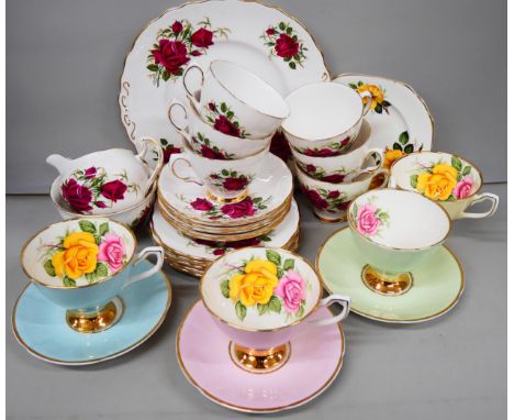Three Staffordshire Etruria Carvour ware teacups and saucers, one similar cup, and a six setting Colclough bone china tea set
