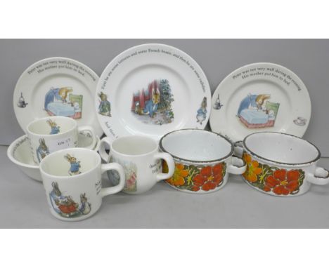 A collection of seven pieces of Wedgwood Beatrix Potter Peter Rabbit china, including plates bowl and mugs. And a pair of Mid