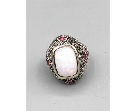 A Substantial silver marcasite ruby and central opal ring