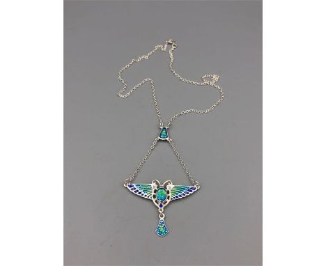 A silver and enamel butterfly style necklace