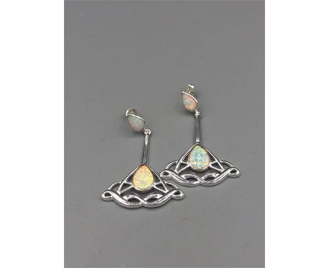 A pair of silver and opal Art Deco style drop earrings