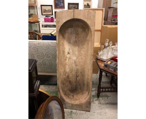 A large wooden trug or bread dough trough