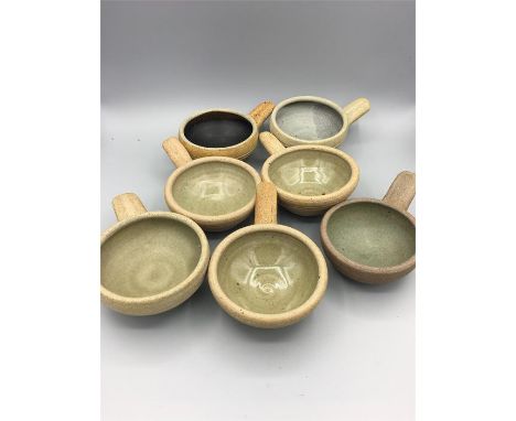 Seven Bernard Leach stoneware ramekins