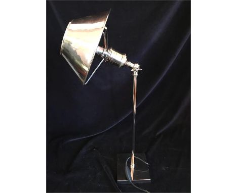 A chrome Desk Lamp