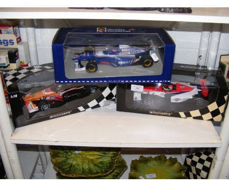 Two Pauls Model Art Minichamps - Racing Cars, together with a similar Jacques Villeneuve model 