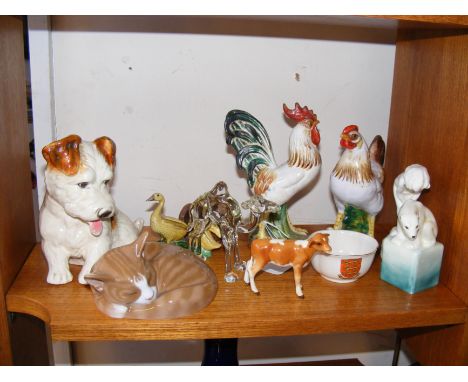 A small Beswick calf, Royal Copenhagen cat etc. CONDITION REPORT This lots contains 12 items in total.We have attached a numb