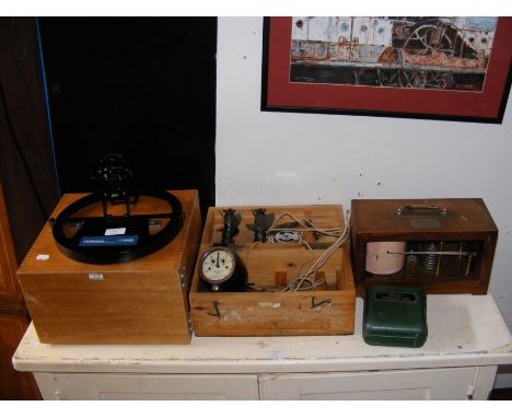 A boxed ship's log, together with barograph for restoration and two other instruments