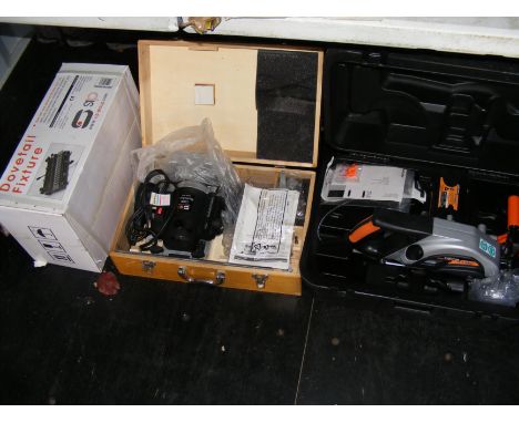 Two routers, together with a dovetail tool