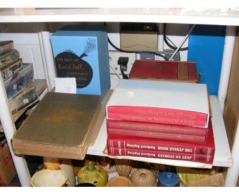 A selection of vintage children's books, including Rudyard Kipling and Lewis Carroll 