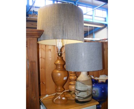 Two turned wood table lamps, together with Cornish Tremaen pottery table lamp 