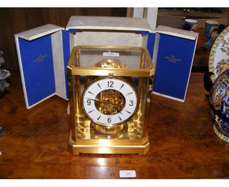 A vintage Jaeger LeCoultre Atmos clock with original box and manual - 24cm high CONDITION REPORT not workingOur team of trust