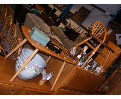 A mid century Ercol Golden Dawn coffee table with Ercol stool CONDITION REPORT In our judgement, condition of lot is good. Ou