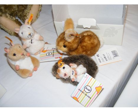 Four modern Steiff toy animals, including Hedgehog 