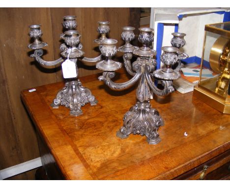 A pair of decorative 30cm high silver plated candelabra