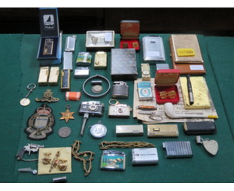 SUNDRY LOT INCLUDING VARIOUS NOVELTY LIGHTERS, VARIOUS STAMPS, CUFFLINKS, MILITARIA, CIGARETTE CASES, ETC. 
