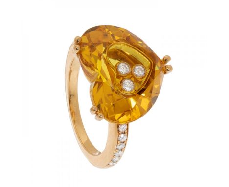 CHOPARD. Ring Happy Diamonds. NO. 6075785 - 82/6234/04.In 18kt yellow gold. With a large heart-cut yellow citrine with three 