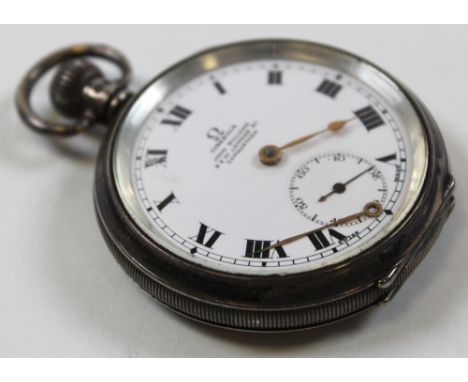 Omega silver cased open face pocket watch, hallmarked Birmingham 1930 with subsidiary second hand dial and white enamel face,