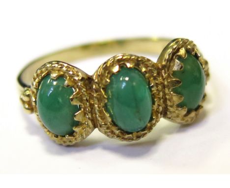 9ct Ring set with 3 cabochon Jade stones size P weight 2.1 grams