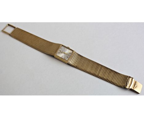 Ladies 9ct gold Longines wristwatch, square silvered dial with gilt batons. The gold bracelet with ladder snap clasp. total w