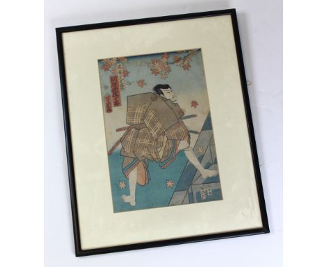 Framed and mounted Japanese colour lithograph depicting a man with a bundle on his back, unframed h.35cm x w.23.5cm.