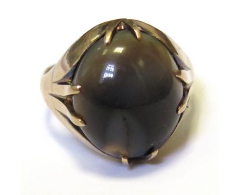 Yellow metal ring set with polished cabochon Onyx stone size O weight 6.2 grams