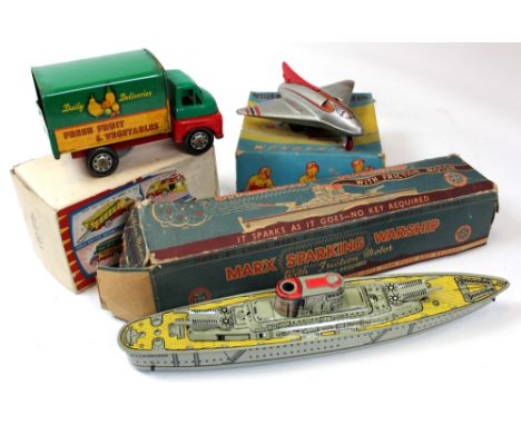Two Wells-Brimtoy vintage tin plate toys in boxes, wonderjet and a truck. Together with a Marx sparking warship also boxed.