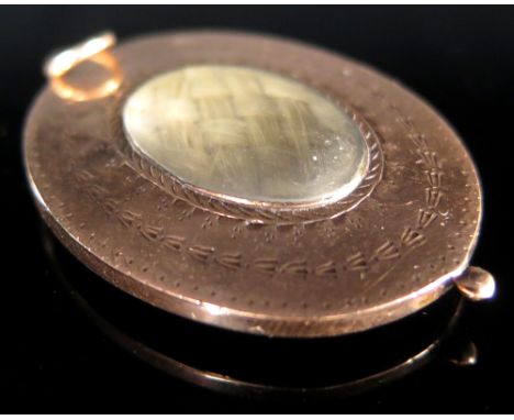 Yellow metal Memorial locket with portrait miniature weight 7.6 grams