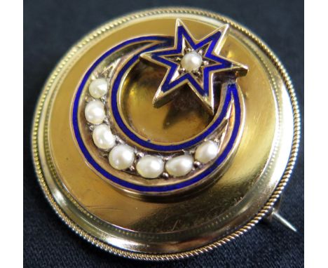 Yellow Metal Brooch with Star and Crescent bordered by blue enamel and set with seed pearls weight 9.4 grams