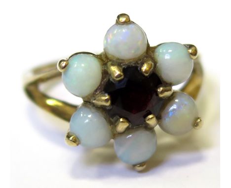 9ct Ring set with Garnet and Opals size N weight 3.6 grams