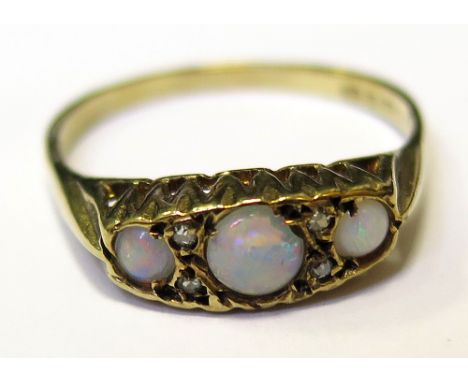 9ct Ring set with opals and diamonds size P weight 1.9 grams